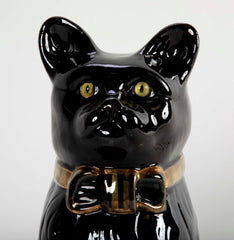 French Glazed Ceramic Black Cat with Glass Eyes & Gilt Bow