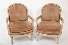 A Pair of Louis XVI Style Suede and Painted Armchairs by Maison Jansen