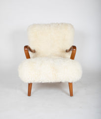 Mid-Century Danish Chair of Elm Wood and Sheepskin in the Style of Arctander