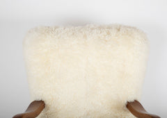 Mid-Century Danish Chair of Elm Wood and Sheepskin in the Style of Arctander