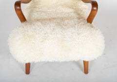 Mid-Century Danish Chair of Elm Wood and Sheepskin in the Style of Arctander