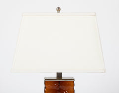 A Pair of Mid-Century Wavy Amber Glass & Steel Lamps