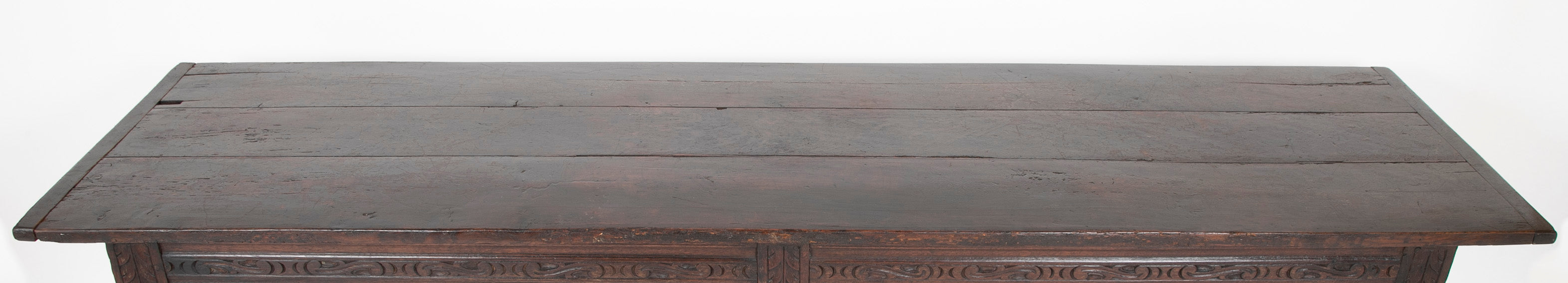 An 18th Century English Oak Refectory Table with Carved Apron