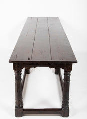 An 18th Century English Oak Refectory Table with Carved Apron