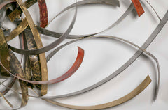 Mixed Metal Wall Sculpture titled "Saturn's Rings" by Silas Seandel