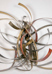 Mixed Metal Wall Sculpture titled "Saturn's Rings" by Silas Seandel