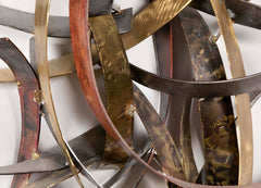 Mixed Metal Wall Sculpture titled "Saturn's Rings" by Silas Seandel