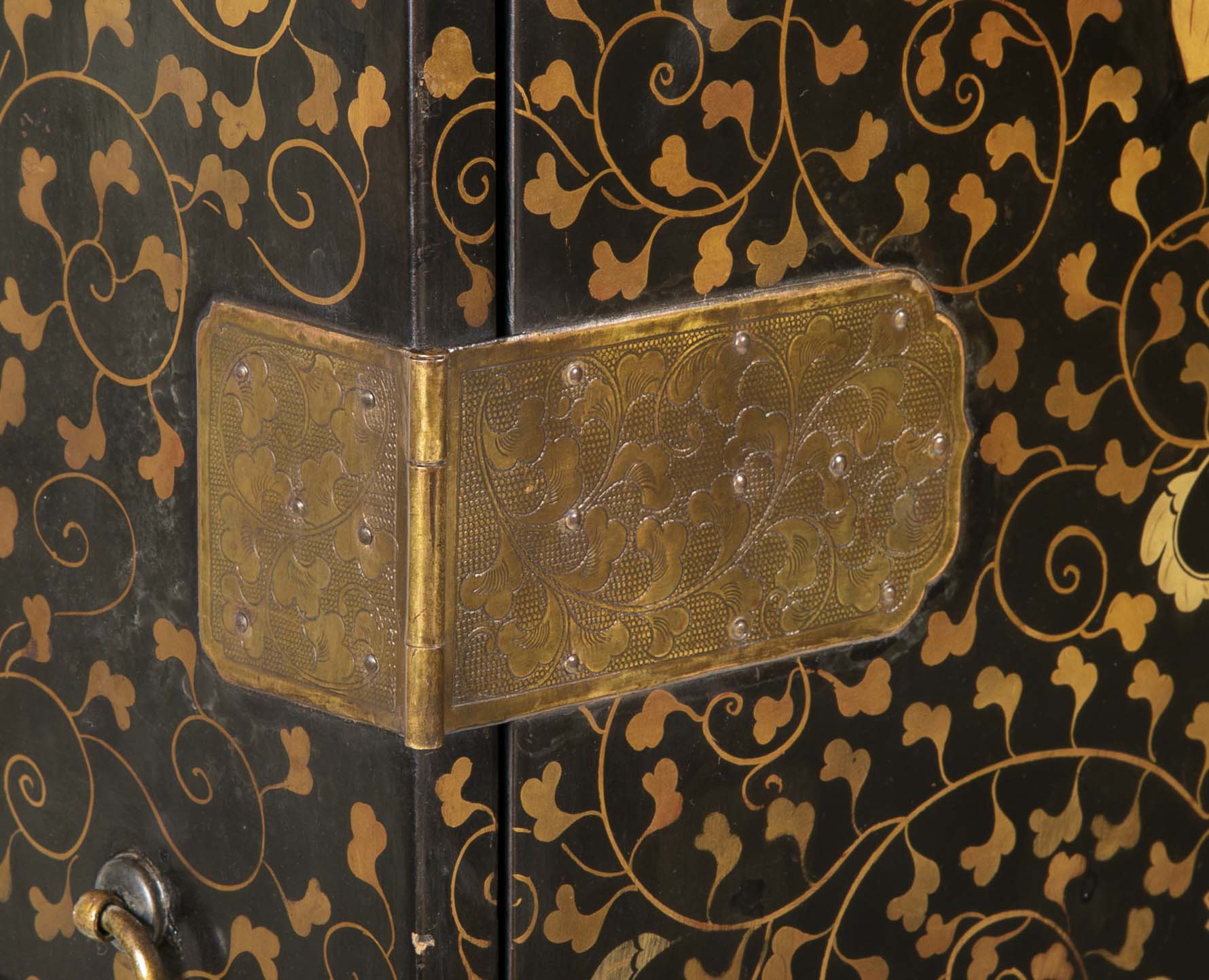 A Large Japanese Black and Gold Lacquered Cabinet on Stand with Gilt Mounts