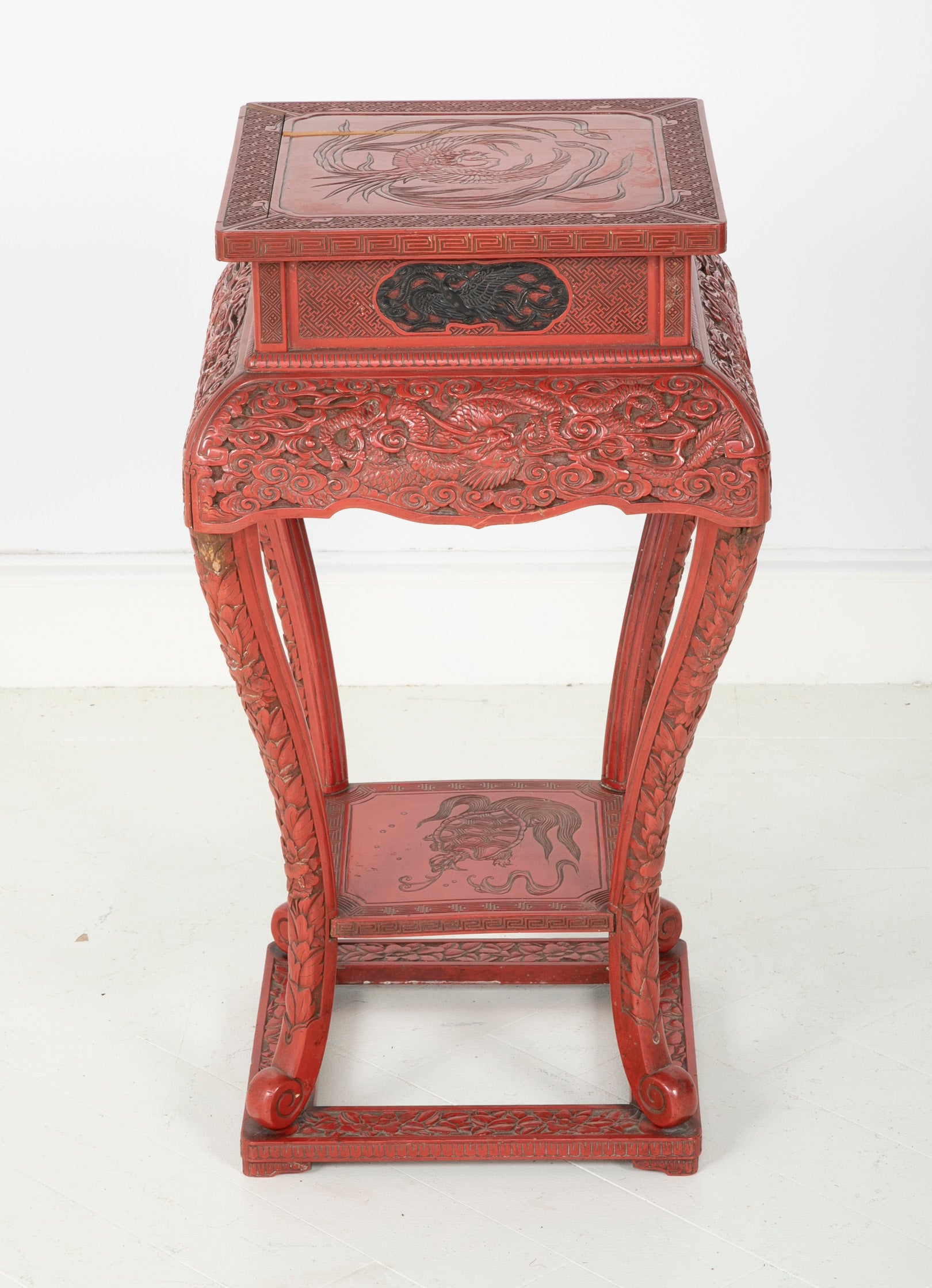 A Cinnabar Lacquer Stand of Square Sectioned Form