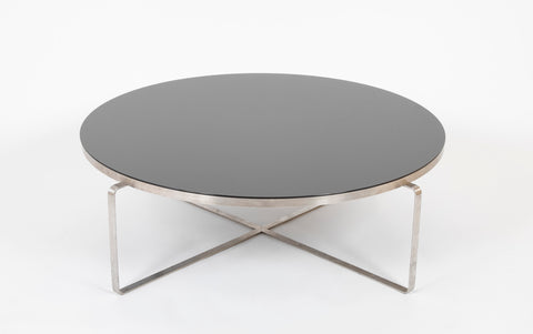 A Black Glass and Brushed Steel Coffee Table In The manner of Poul Kjaerholm