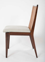 A Set of Eight Walnut and Caned Dining Chairs Designed by Edward Wormley.