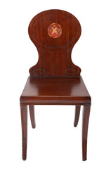 A Pair of Late Georgian Mahogany and Polychrome Hall Chairs