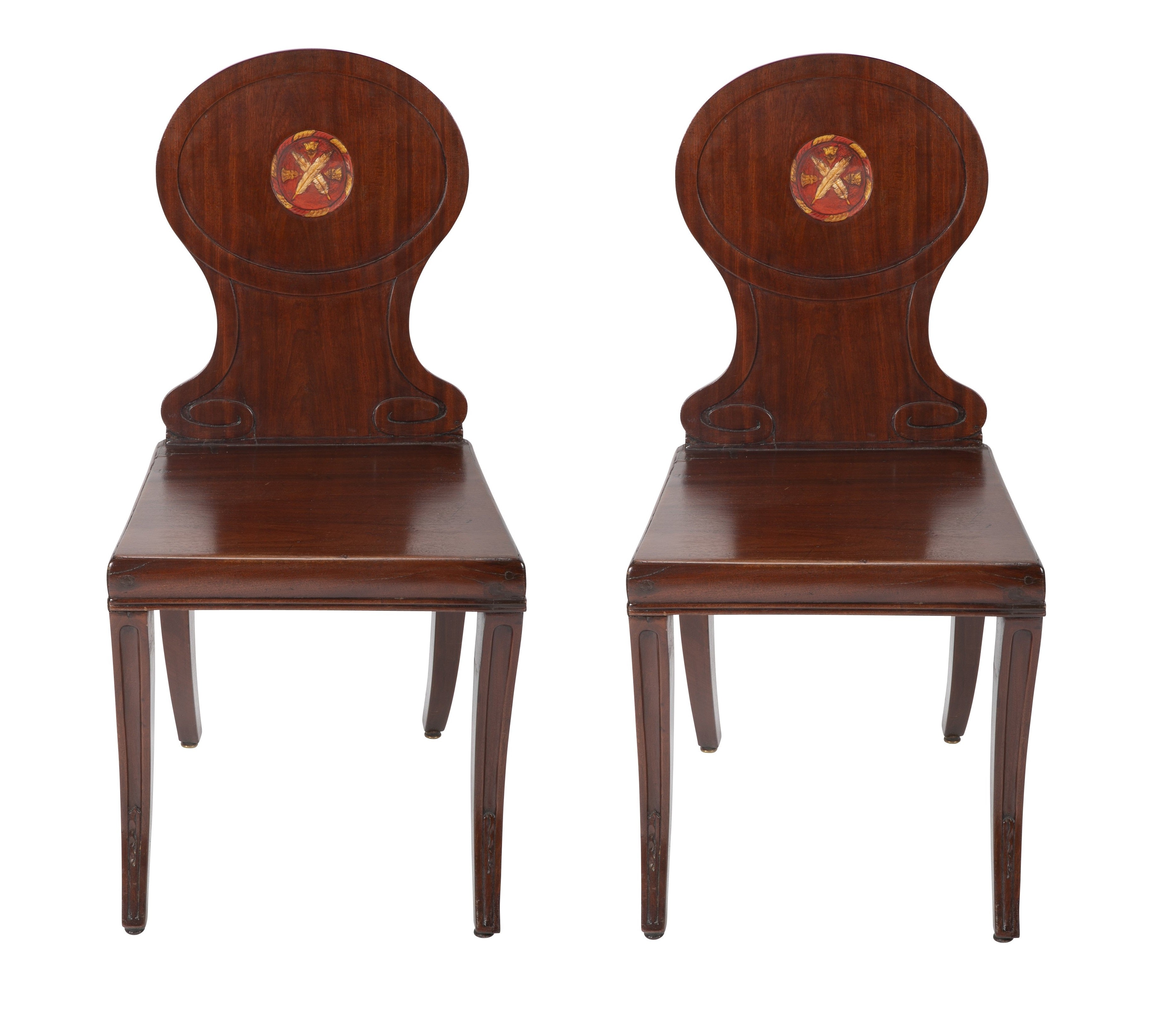 A Pair of Late Georgian Mahogany and Polychrome Hall Chairs