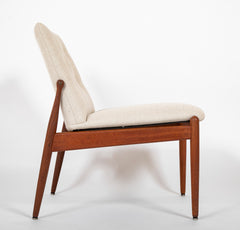 A Pair of Scandinavian Mid-Century Modern Teak Slipper Chairs