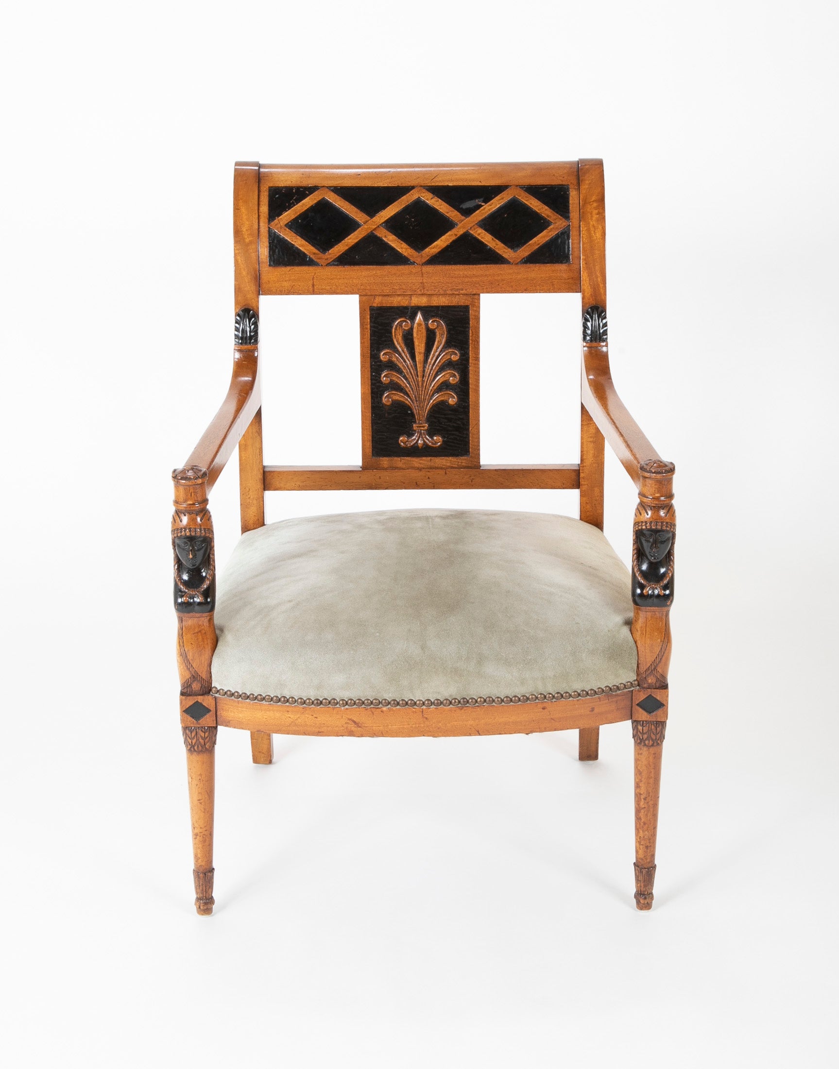 A Pair of Continental Neoclassical Chairs with Carved Egyptian Head on the Arm