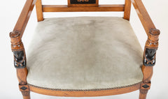 A Pair of Continental Neoclassical Chairs with Carved Egyptian Head on the Arm