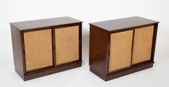 A Pair of Walnut Cabinets with Cane Fronted Sliding Doors