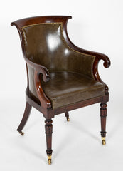 A Mahogany Library Chair with Curled & Carved Crest Upholstered in Leather