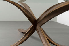 A Oval Glass And Bronze Coffee Table Designed by Michel Mangematin