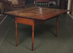 An American Stained Pine Drop Leaf Table