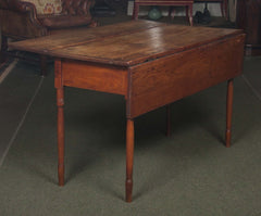 An American Stained Pine Drop Leaf Table