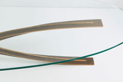 A Oval Glass And Bronze Coffee Table Designed by Michel Mangematin