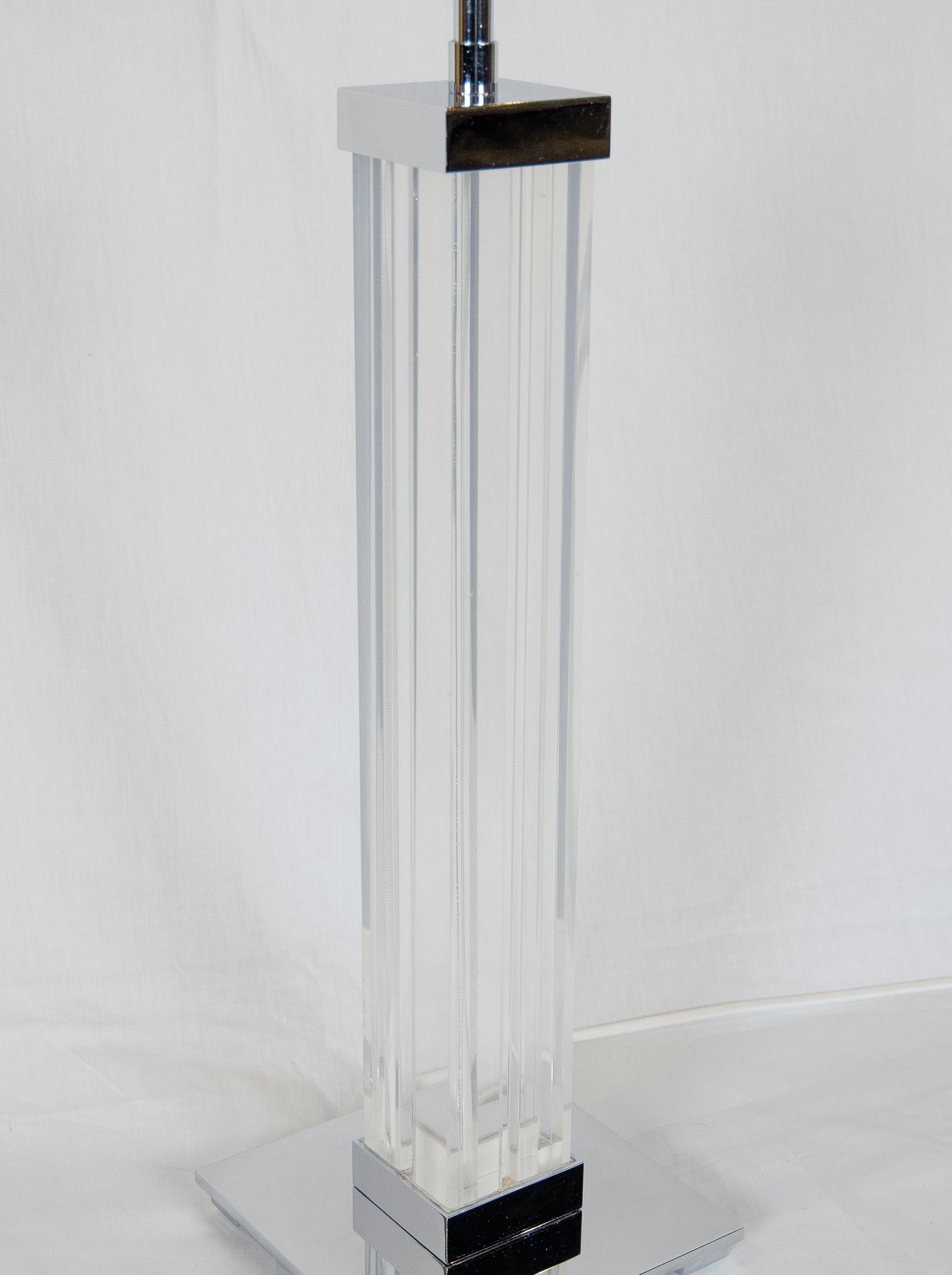 A Pair of Karl Springer Lucite and Chrome Table Lamps