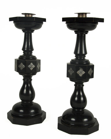 A Pair of Cotswold School Ebonized Candlesticks