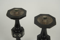 A Pair of Cotswold School Ebonized Candlesticks