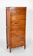 A Seven Drawer French Provincial Cherrywood Linen Chest