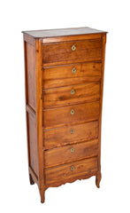 A Seven Drawer French Provincial Cherrywood Linen Chest