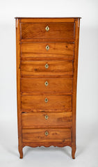 A Seven Drawer French Provincial Cherrywood Linen Chest