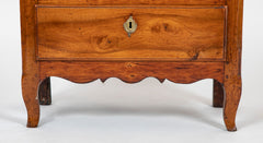 A Seven Drawer French Provincial Cherrywood Linen Chest