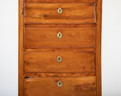 A Seven Drawer French Provincial Cherrywood Linen Chest