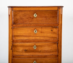 A Seven Drawer French Provincial Cherrywood Linen Chest