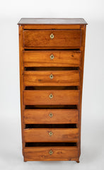 A Seven Drawer French Provincial Cherrywood Linen Chest