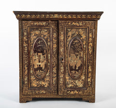 A Chinese Two Door Black Lacquered Table Top Chest