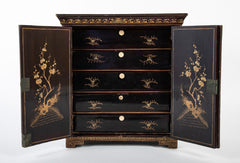 A Chinese Two Door Black Lacquered Table Top Chest