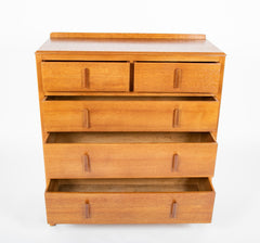 Pair of English Cotswold School Limed Oak Five Drawer Chests