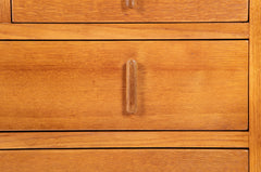 Pair of English Cotswold School Limed Oak Five Drawer Chests