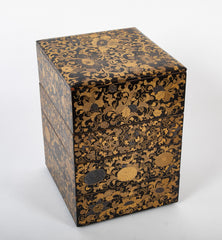 A Japanese Black Lacquer 4 Tier Bento Box with Gilt Floral Designs