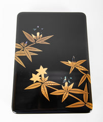 A Wajima Lacquered Covered Box with Gilt Leaf Decoration