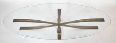 A Oval Glass And Bronze Coffee Table Designed by Michel Mangematin