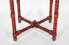 A Red Norwegian Table with Colorful Floral Painted Decoration