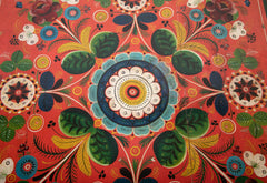 A Red Norwegian Table with Colorful Floral Painted Decoration