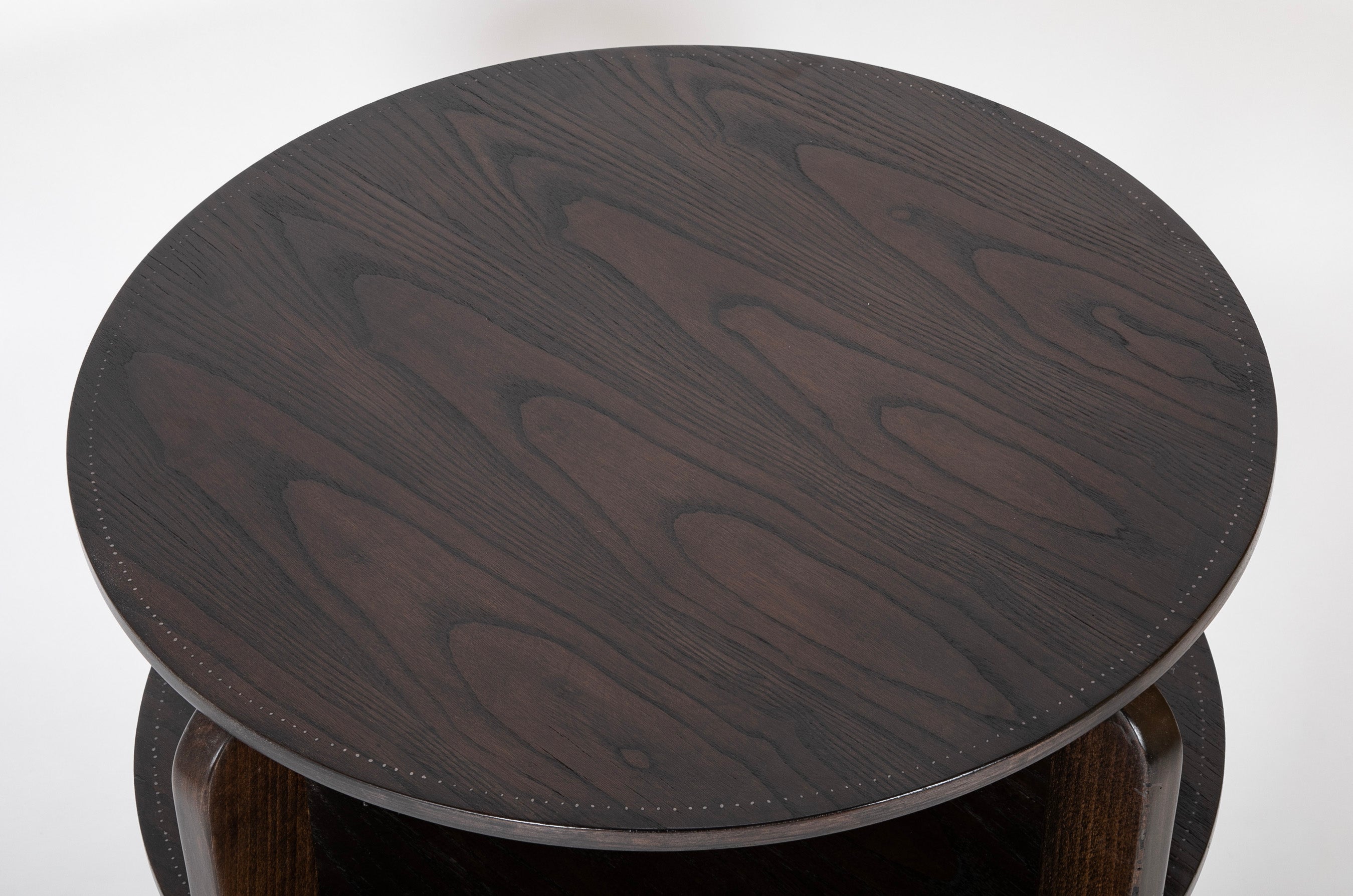 A Sornay Round Occasional Table with Subtle Studding Detail