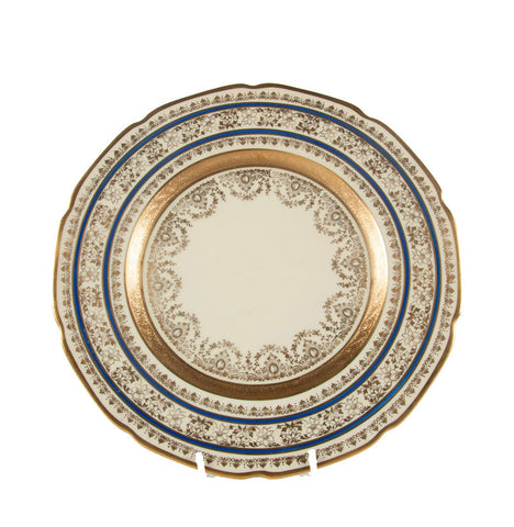 A Set of 12 Porcelain Dining Plates by Heinrich & Co.