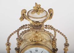 An 18th Century Gilt Bronze French Portico Clock