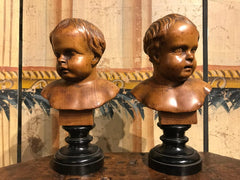 Pair of South German Carved Wood Busts of Putti