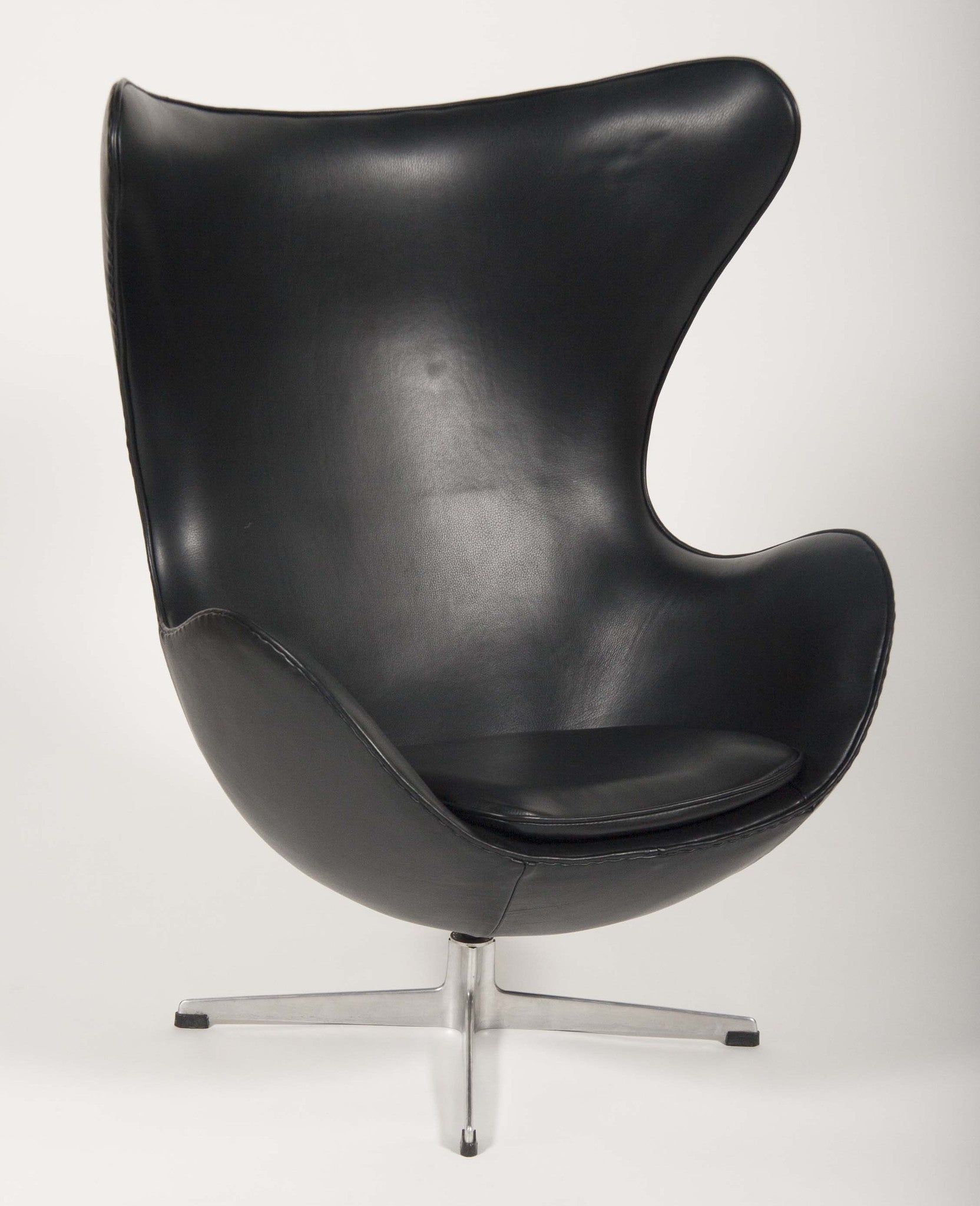 Leather egg sales swivel chair